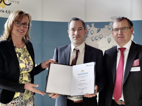 Dr. Dieter Braun und Michael C. Krutwig PhD nehemen Auszeichnung entgegen