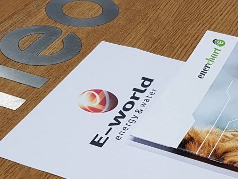 Picture of e-world flyer with enerchart booklet on top